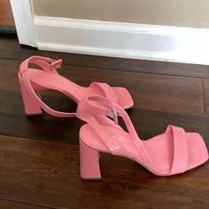 Worn once to a wedding.  Extremely comfortable!  Bubble gum pink color!